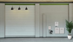 Dura5 solar battery and Dura-i hybrid inverter on a garage wall