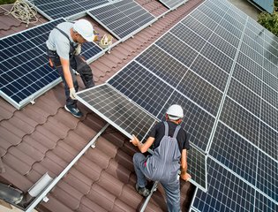 Solar Panels being installed on a roof