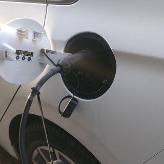 Close-up photograph of a DuraCharger plugged into a car
