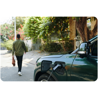 Person walking away from EV charging