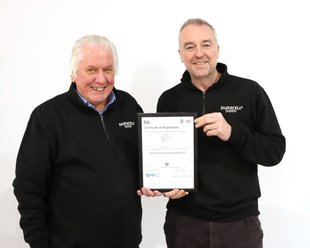 Phil Warner and Mark Millar with the ISO certification